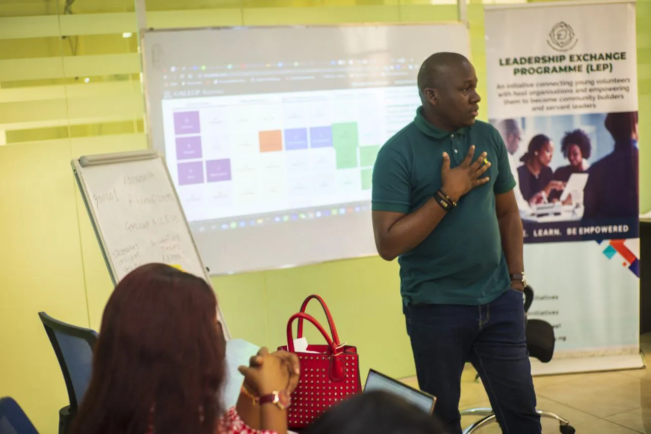 Seun Onakoya, leadership coach in Abuja, delivering a team workshop